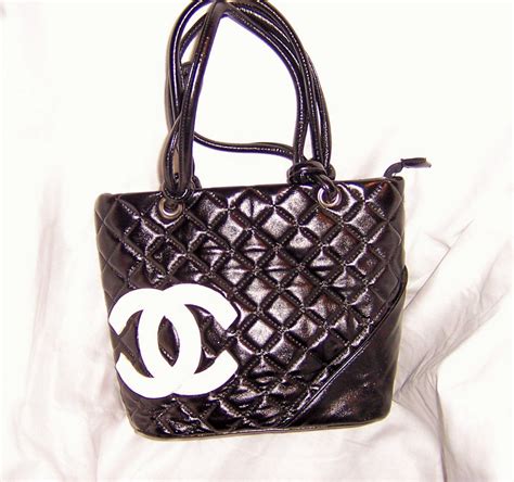 black and white vintage chanel handbag|More.